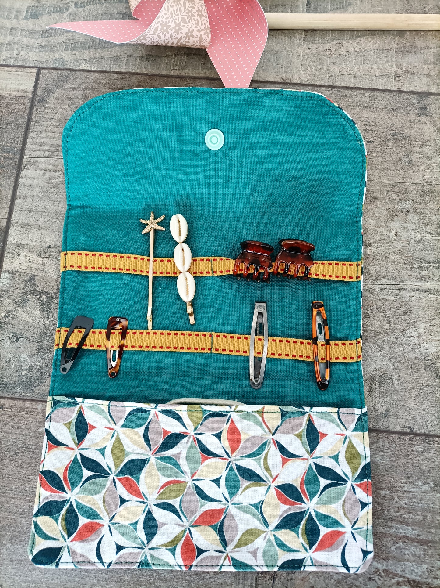 Pochette à barrettes