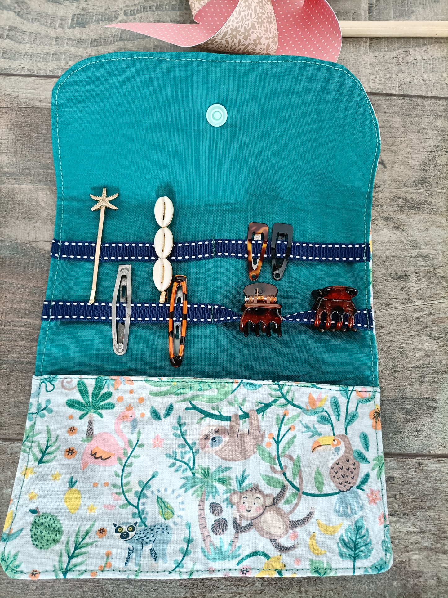 Pochette à barrettes