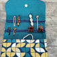 Pochette à barrettes