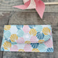 Pochette à barrettes